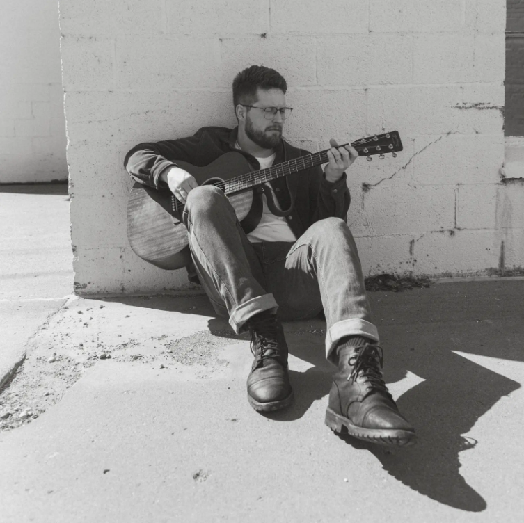 Matt Rees with his guitar