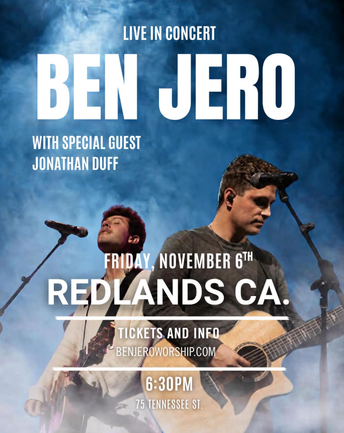 Ben Jero and Jonathan Duff performing against blue concert smoke