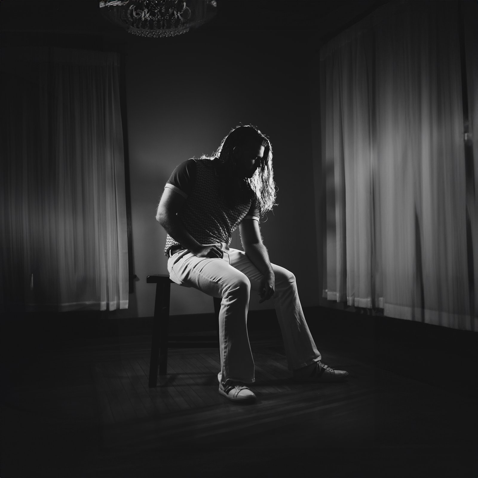 Tyler Philip Ratcliffe seated in a quiet room